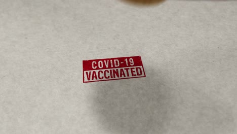 vaccinated covid-19 stamp and stamping loop animation