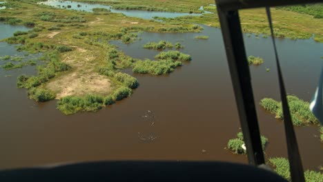 Aerial-shot-of-a-lake-from-a-helicopter