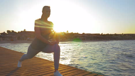 young woman doing lunge exercise