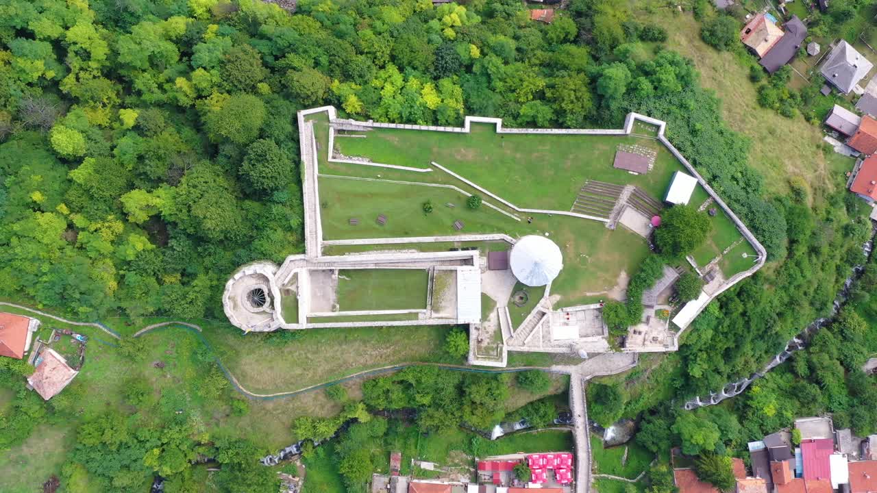 Travnik Castle in Bosnia and Herzegovina seen from above, Aerial pan right shot