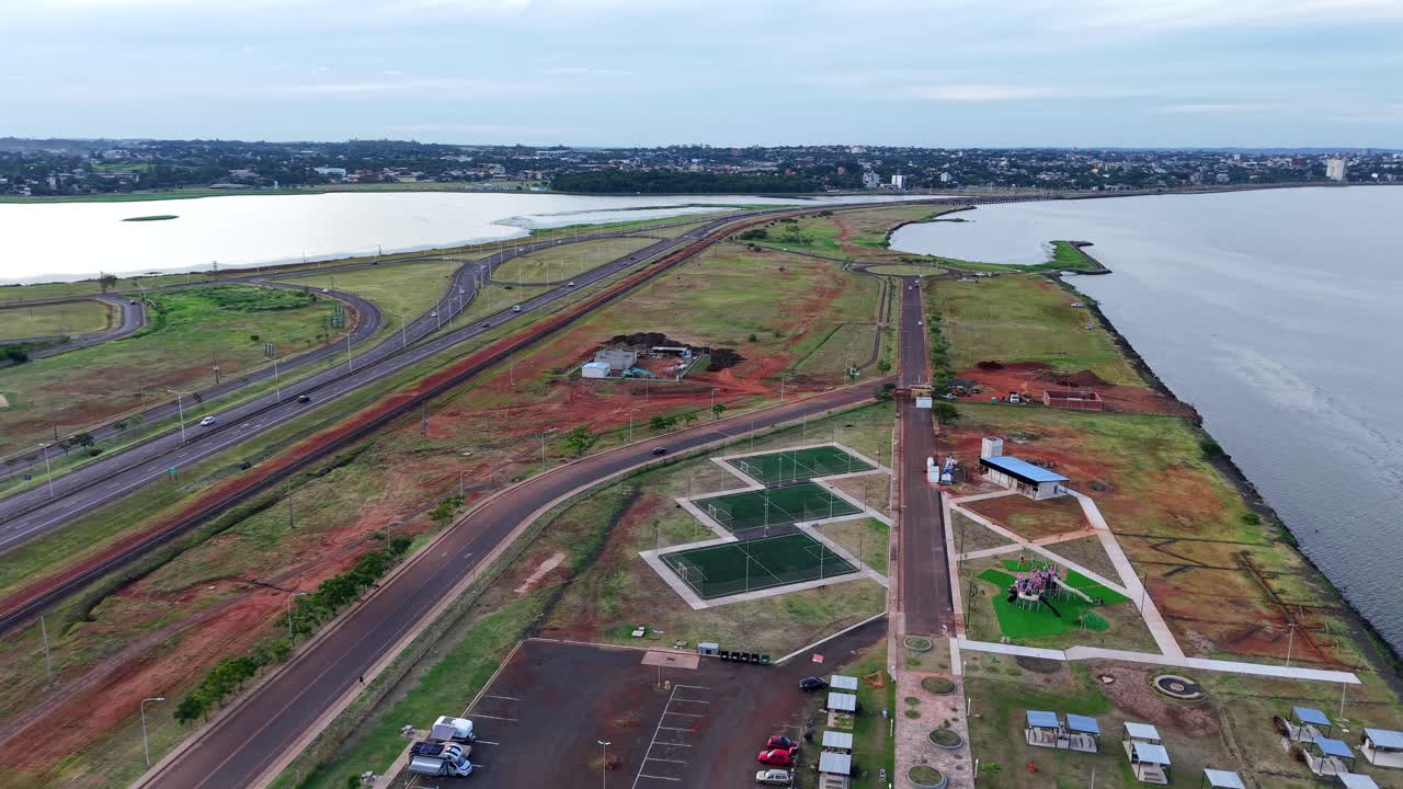 Aerial Establishing View of Traffic, Urban Area and Soccer Fields in Posadas Misiones Argentina