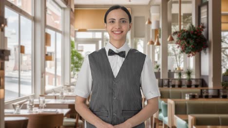 happy indian woman waiter smiling