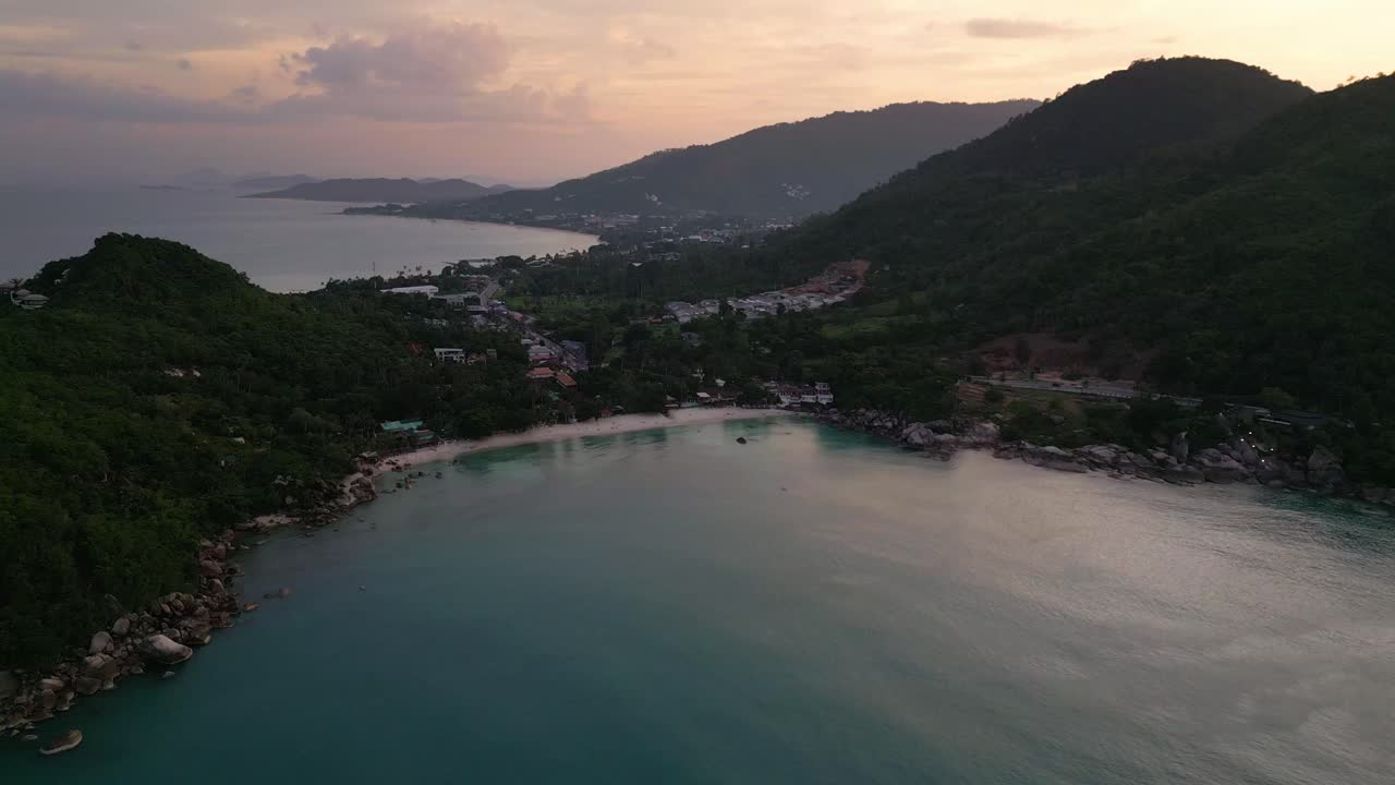 Aerial sunset in Koh Samui Thailand drone fly above silver beach near Lamai village