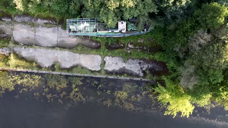 Arial-drone-shot-of-abandoned-ship-in-old-abandoned-port