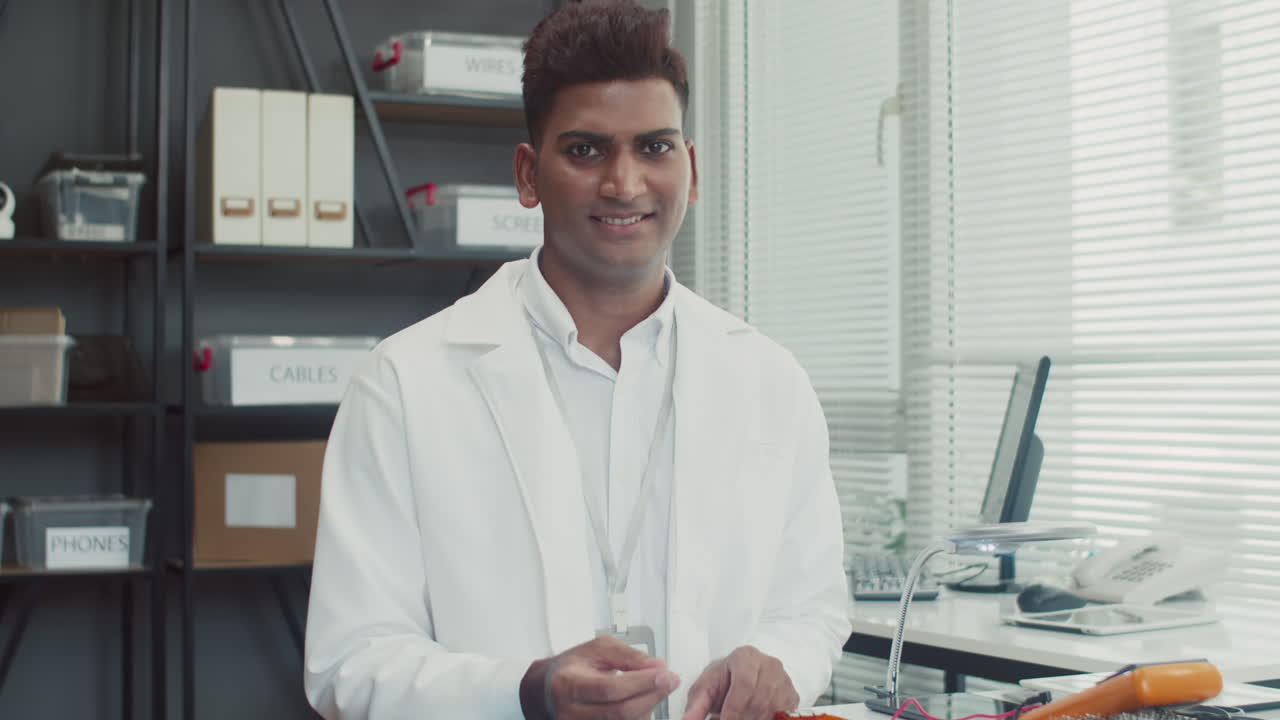 Portrait of Repairman Working at Service Center