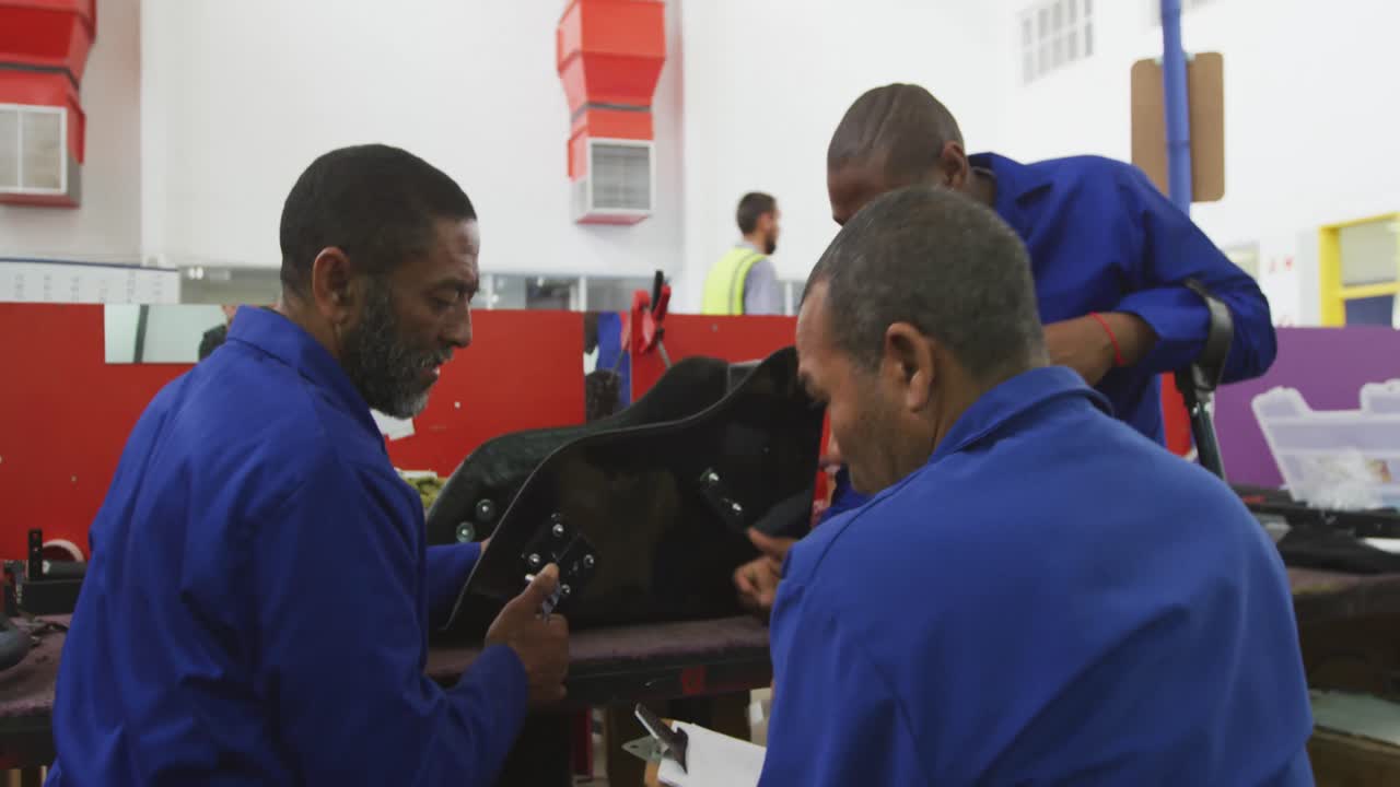 Disabled men talking about the work