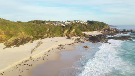 Burgess-Beach-in-Forster,-New-South-Wales-coastal-landscape,-aerial-reveal