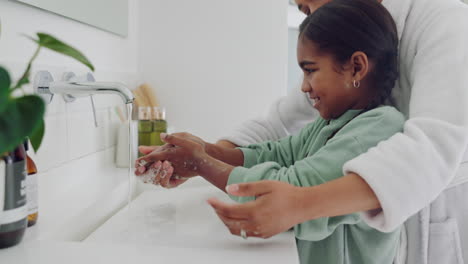 teaching, mother or child cleaning hands