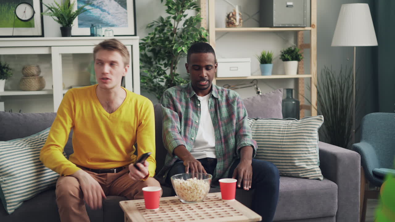 Friends Watching Movie at Home