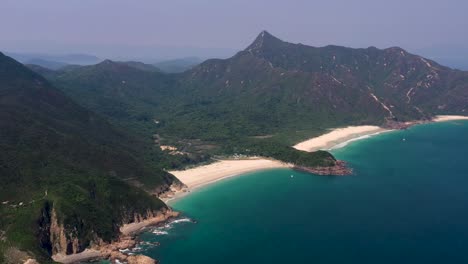 Aerial-shot-of-empty-beach-in-Big-Wave-Bay,-Sai-Kung,-Hong-Kong
