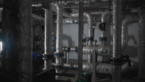 hot steam pipes with thermal insulation and valves