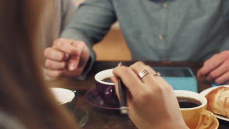 hands, business and people brainstorm with books