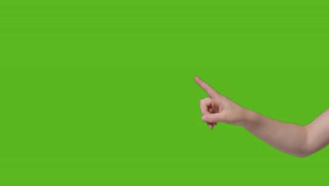 Close-Up-Of-Child-Making-Online-Scrolling-Gesture-Against-Green-Screen