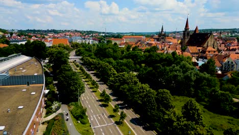 4K Aerial Drone Video of the St. Johannis Kirche Church, Kirche St. Gumbertus Church, and Brücken-Center Ansbach Shopping Mall in Ansbach, Germany