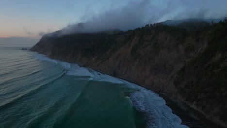 california ocean nature usal beach campground aerial drone mist clouds bluffs cliffside mountain rocky rugged remote coast vibrant sunset sinkyone wilderness waves crashing surf swell forward upwards