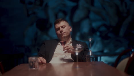 man sitting alone in a restaurant