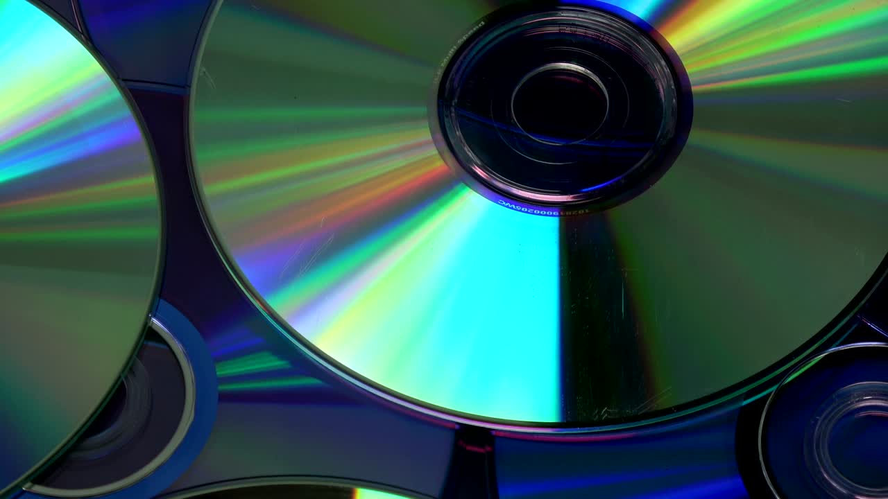 fondo de los discos de cd y dvd giratorios