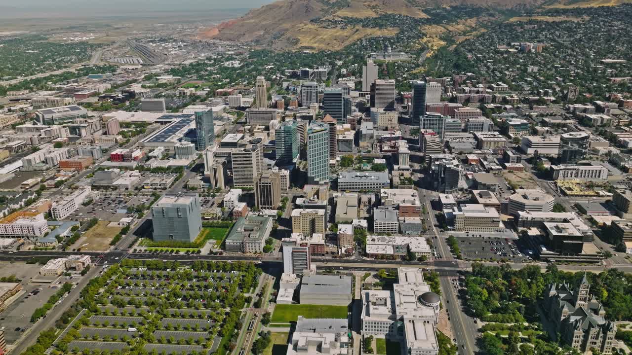 Salt Lake City Utah Skyline at Day, Mountains Behind, Aerial Drone