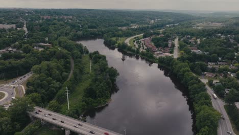 Bridge-Over-Magog-River-In-Sherbrooke,-Canada---Aerial-Drone-Shot