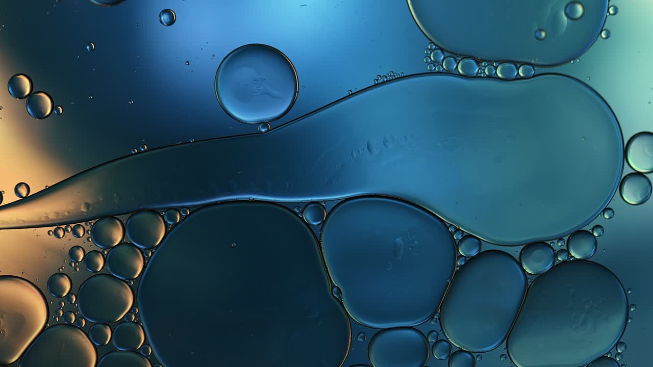 Abstract Colorful Food Oil Drops Bubbles and spheres Flowing