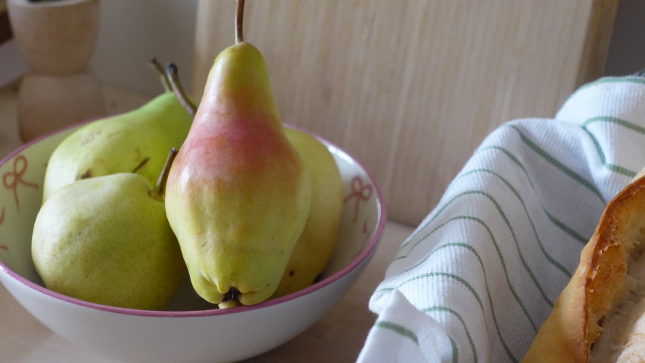 Pears and Bread on a Wooden Table