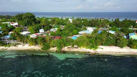 aerial view of dhangethi town, beach and reef