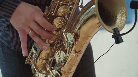 saxophonist plays the saxophone slow motion