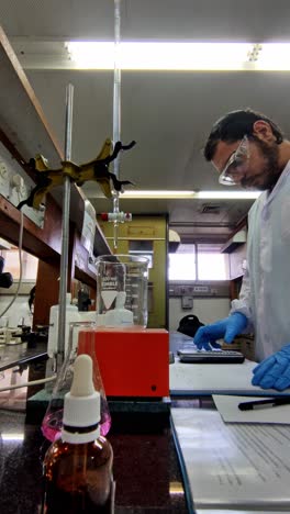 scientific researcher cross-referencing data