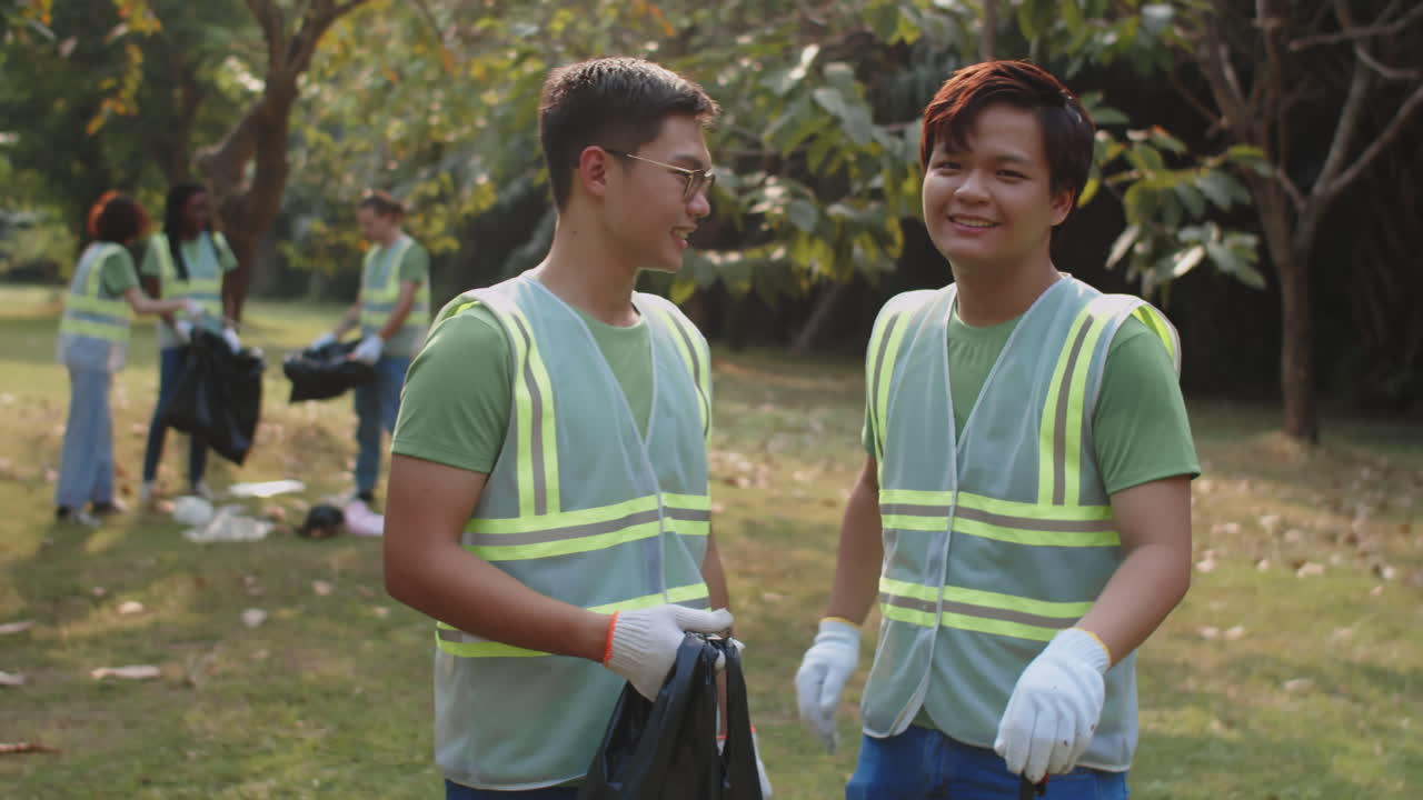 Male Friends Posing when Volunteering in Local Park