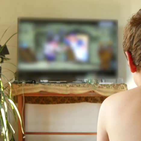 child boy watching tv
