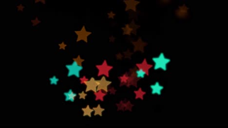 beautiful star bokeh from moving car and traffic lights at the evening, christmas, winter, holiday or glamour party background concept, copyspace