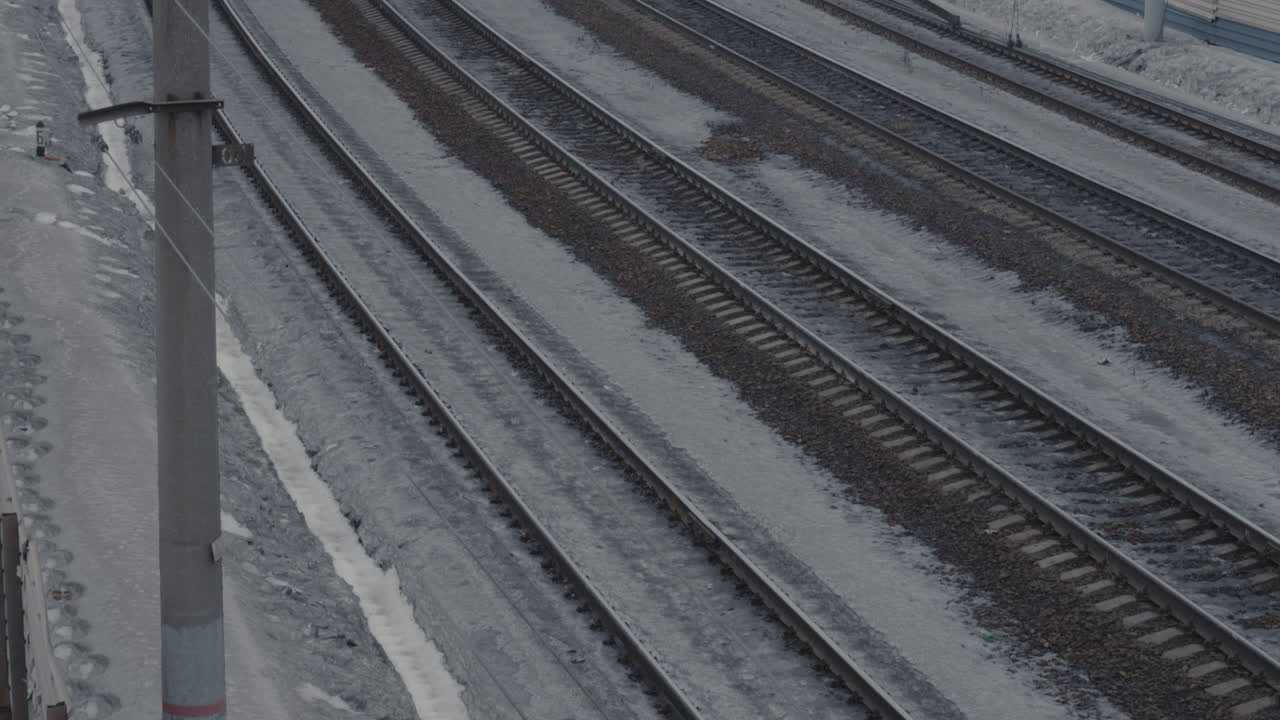 Train on Railroad Tracks in Winter