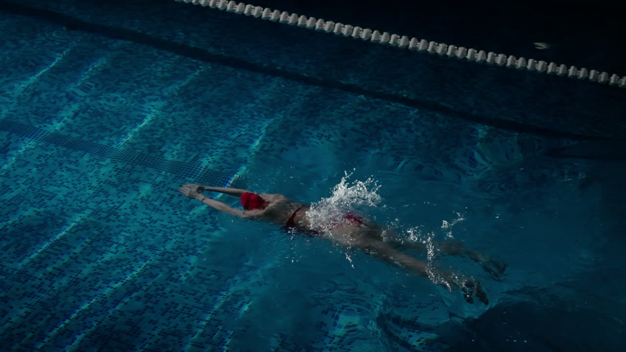 Woman swimming in a pool