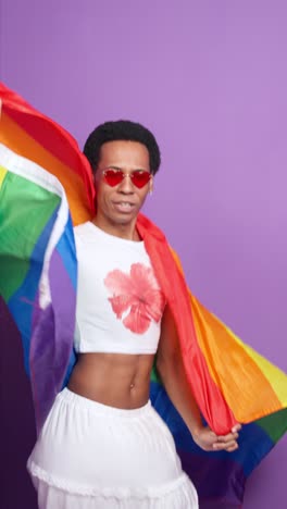 young person celebrating pride month