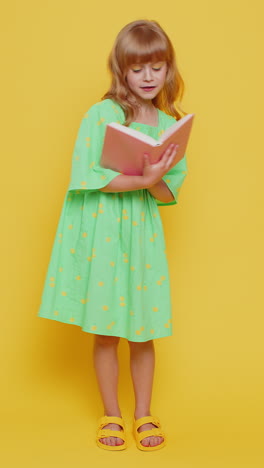 school child kid girl reading funny interesting fairytale story book leisure hobby learning study