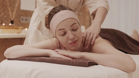woman having back massage