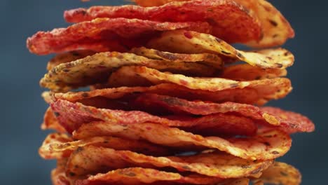 a tower of crunchy delights: stack of colorful, crispy chips showcasing an irresistible snack for any occasion