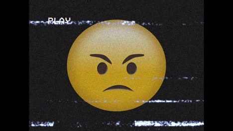 Digital-animation-of-vhs-glitch-effect-over-angry-face-emoji-against-black-background