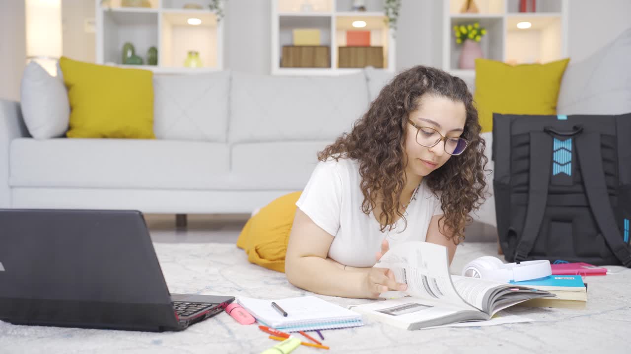 Female student bored with studying.