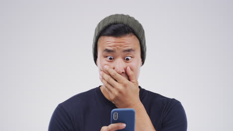 man watching funny video on a phone