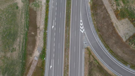 highway with bridge over it, aerial top down view