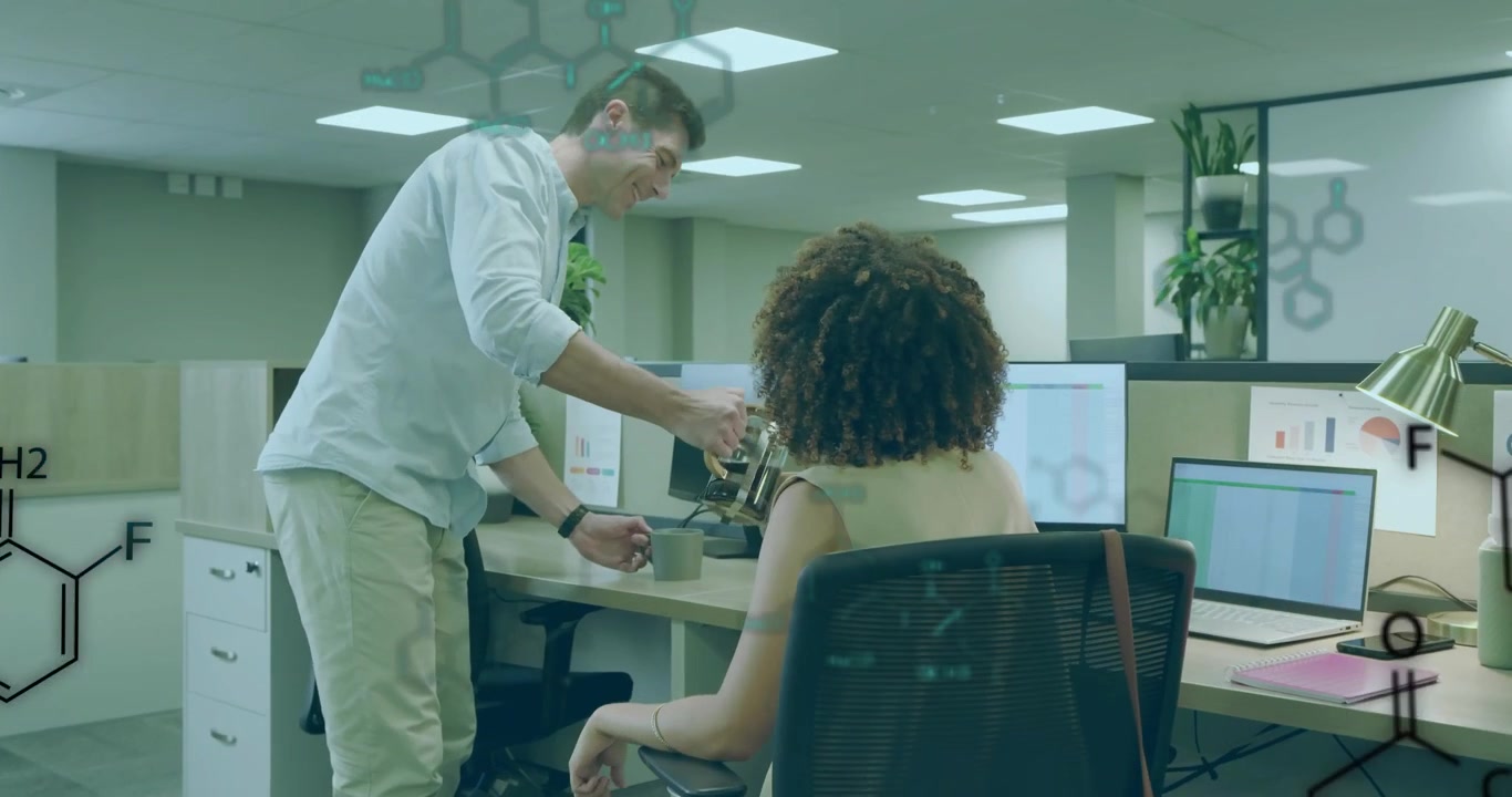 Male walking with press pot through office pouring coffee mug amid floating chemicals to serve peer