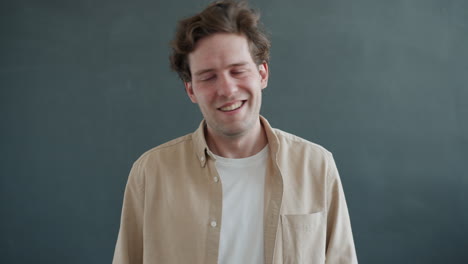 man portrait in beige shirt