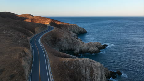winding coastal road along ocean cliffs