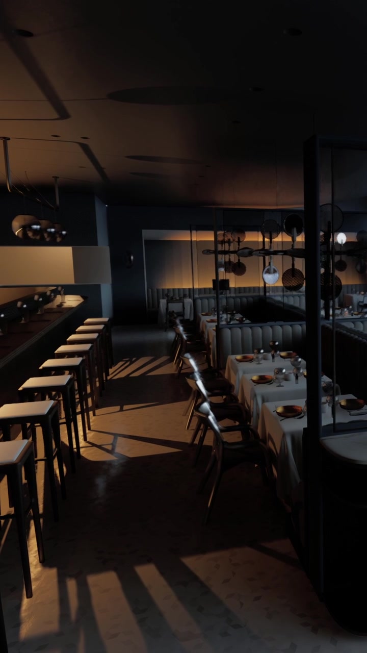 Dining area with tables and chairs at a modern restaurant during evening hours