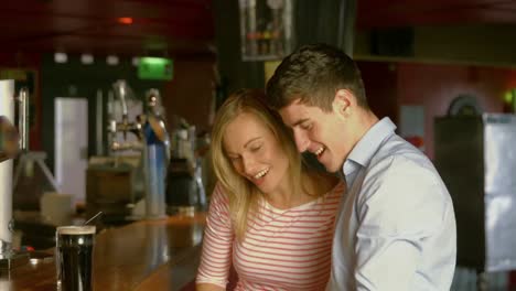 Colleagues-taking-selfie-at-the-bar-together