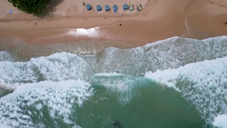ocean waves crashing on surin beach phuket thailand