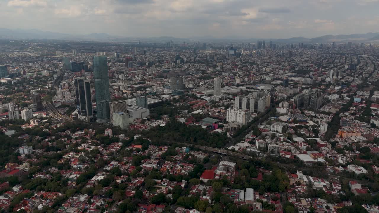 Aerial perspective of Mexico City on a clear day above valley