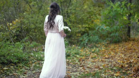 bride walking in the forest