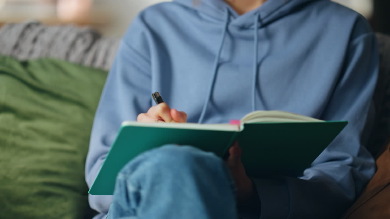 Writing in a notebook